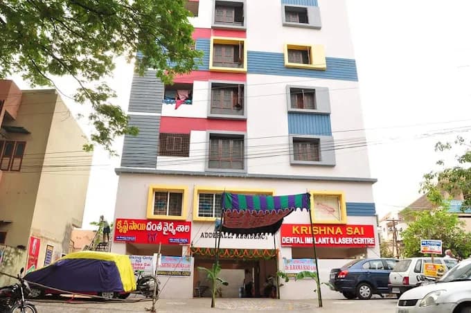 Krishna Sai Dental clinic exterior and dedicated parking in Vijayawada